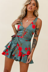 Wishful Thinking Plunging Neckline Ruffle Hem Romper Floral Print Sage