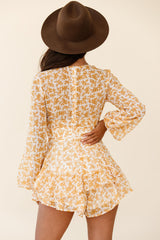 Maddox Fit & Flare Long Sleeve Romper Dainty Floral Print Mustard