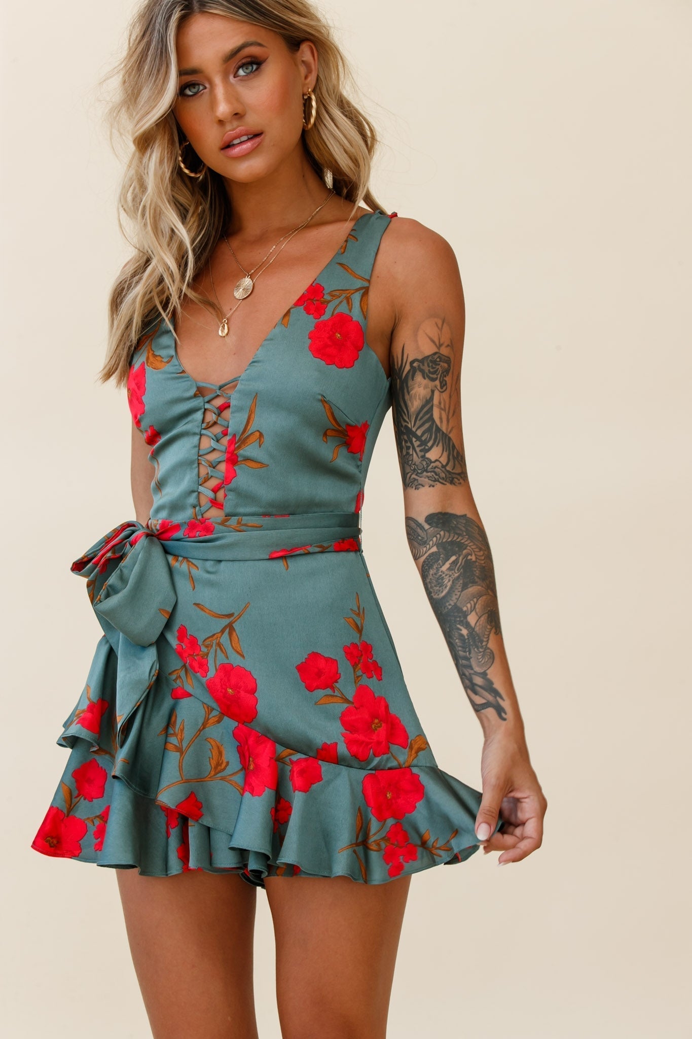 Wishful Thinking Plunging Neckline Ruffle Hem Romper Floral Print Sage