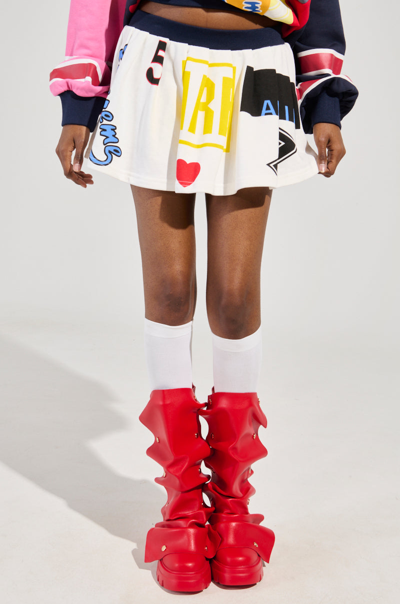 WE ARE INFINITE PLEATED MINI SKIRT